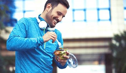 Dental implant patient in DeSoto eating after exercise